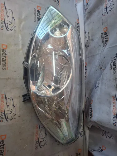 Farol Dianteiro Esquerdo Sandero 11/14 Original 29580 Esquerdo/motorista