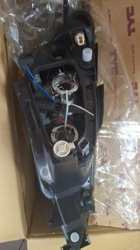 Farol Peugeot 206 04 /07  Duplo Elet. Esq Tyc 29196-05214