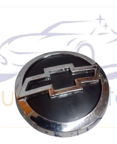 Emblema Grade Dianteira Chevrolet Celta 01/..06 12983 Bac01