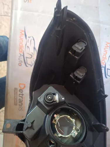 Farol Dianteiro Esquerdo Sandero 11/14 Original 29580 Esquerdo/motorista