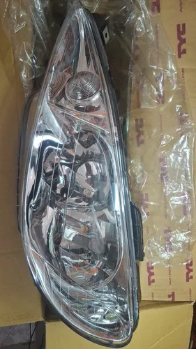 Farol Peugeot 206 04 /07  Duplo Elet. Esq Tyc 29196-05214